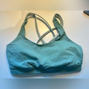 Lululemon Energy bra. Like new, beautiful mint green with two tone straps.
